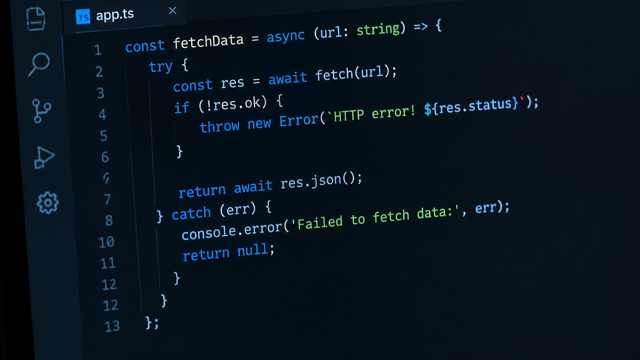 Close up of programming code displayed on a dark screen